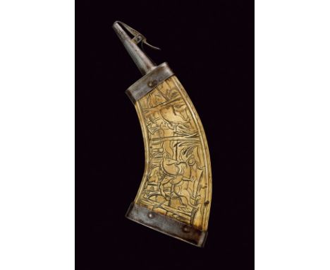 An engraved powder-flask dating: 17th Century provenance: Germany Curved body of pressed iron. The front surface engraved wit