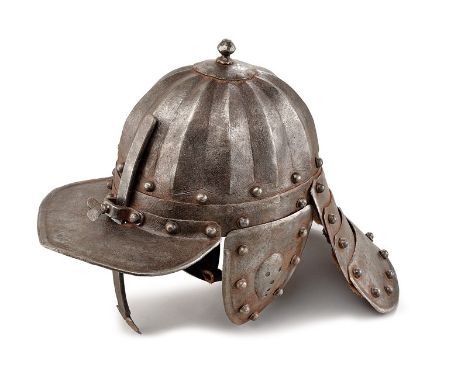 A lobster tail helmet dating: 19th Century provenance: Northern Germany Made of iron, the skull worked with rays, the brim an