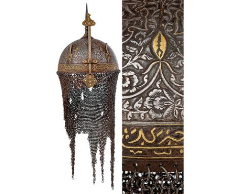 A khula-khud dating: late 19th Century provenance: India Hemispherical, engraved, iron skull, finely engraved with effigy of 