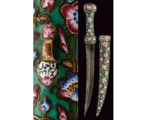 A fine enamelled kard dating: late 18th Century provenance: Indopersia Curved, double-edged damask blade ribbed at the centre