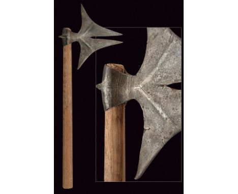 A Bullova axe dating: 19th Century provenance: India Iron axe; head with double cusp provided with rear spikes, with raisers 