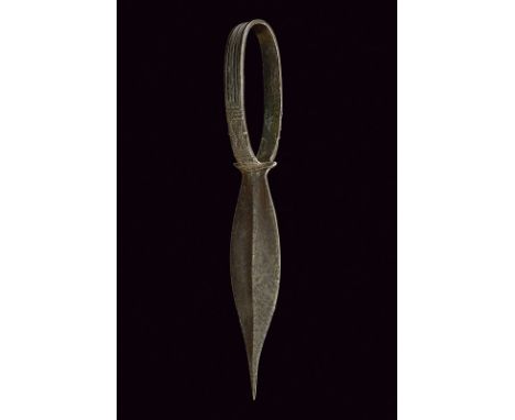 A Tiv dagger dating: circa 1900 provenance: Niger Entirely made of iron, straight double-edged blade with central raiser; chi
