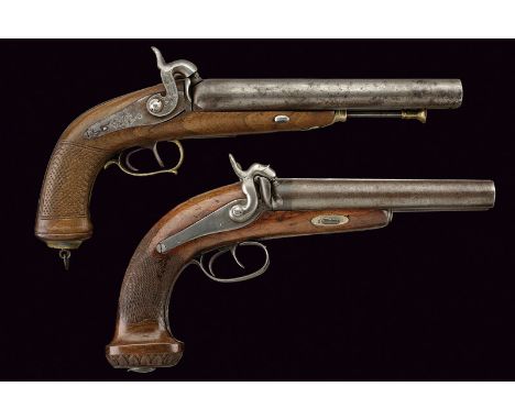 A lot of two hunting percussion pistols dating: mid-19th Century provenance: Europe A pistol with two smooth, juxtapozed, 18 
