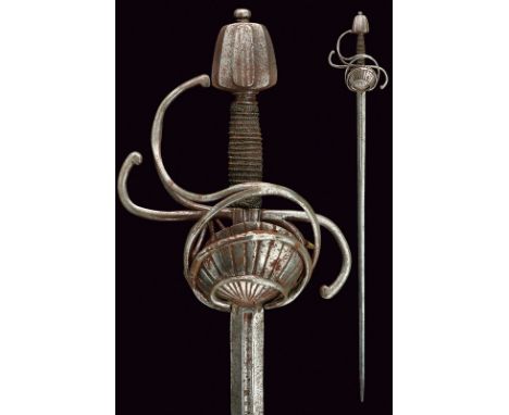 A rapier dating: 19th Century provenance: Germany Straight, double-edged blade of hexagonal section, grooved at the first par