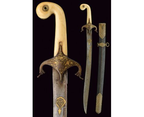 A rare and interesting shamshir dating: early 19th Century provenance: Persia Fine, yatagan-like, damask blade with "T"-back 