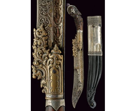 A beautiful piha kaetta dating: 19th Century provenance: Ceylon Typical, single-edged blade richly decorated with silver, par