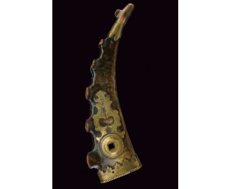A powder-flask with wheel lock key dating: circa 1700 provenance: Southern Germany Of ibex horn; engraved. brass mounts. Iron