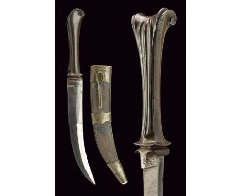 An interesting dagger dating: 19th Century provenance: Turkey Curved, single -and false-edged blade, worked in one piece with