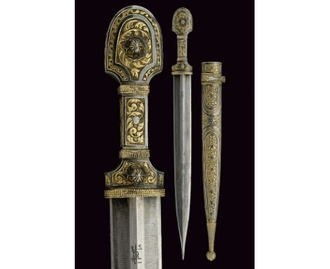 A gilt and nielloed silver mounted kindjal dating: circa 1900 provenance: Caucasia Straight, double-edged blade, ribbed at th