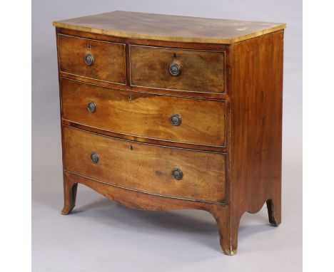 A 19th century mahogany bow-front chest fitted two short &amp; two long graduated drawers with brass ring handles, on splay b