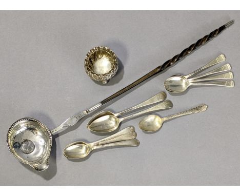 A Georgian un-marked silver punch ladle, the oval bowl inset Queen Anne 1711-shilling, whale-bone twist handle; a pair of Geo