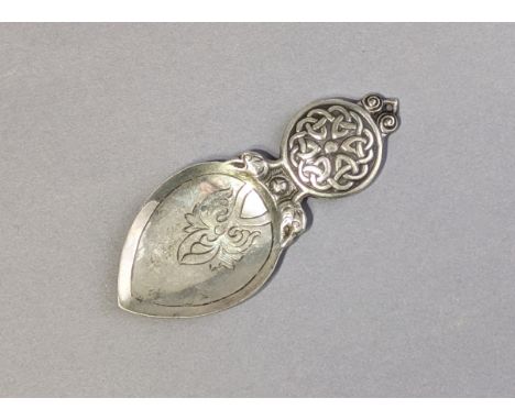A Scottish Arts &amp; Crafts silver caddy spoon by Alexander Ritchie, with engraved ovoid bowl, &amp; Celtic Knot design to t