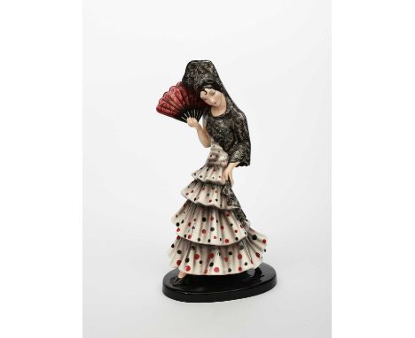 A Goldscheider Pottery model of a Flamenco dancer designed by Claire Weiss, model no.7511, modelled standing in long, flowing
