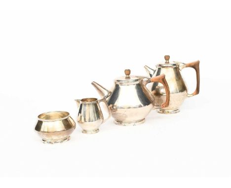 A Nayler Brothers silver four piece tea set, footed, streamline form, comprising teapot and hinged cover, milk-jug and sugar 
