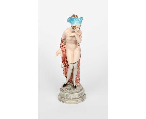 A modern model of woman in the manner of Goldscheider Pottery after a design by Thomasch, modelled, semi-naked wearing stocki