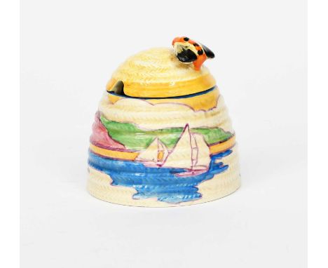 'Gibraltar' a Clarice Cliff Fantasque Bizarre large Beehive preserve pot and a cover, painted in colours printed factory mark