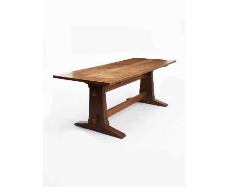 A large oak refectory table the design attributed to Sir Edwin Lutyens, for Deanery Garden, Sonning, rectangular top on plank