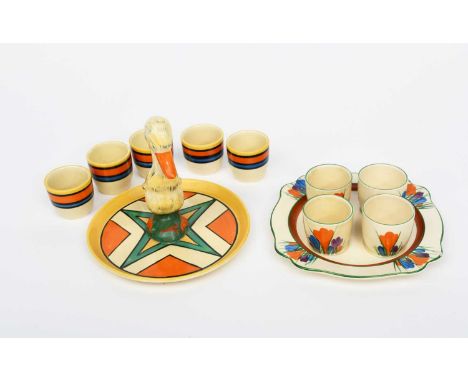 'Original Bizarre' a Clarice Cliff Bizarre Duck cruet tray and five egg cups, painted in colours inside yellow band, the cups