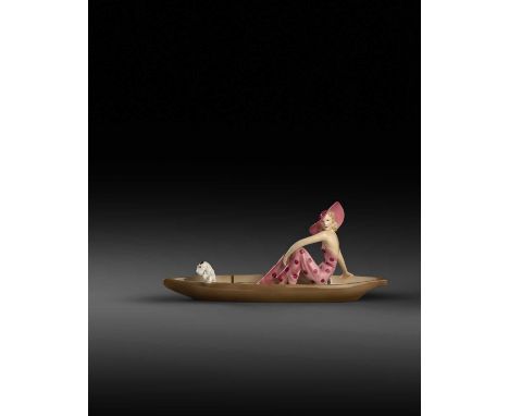 A Goldscheider Pottery model of a Woman and Dog in a Skiff designed by Stephan Dakon, model no.7256, she modelled in a one-pi