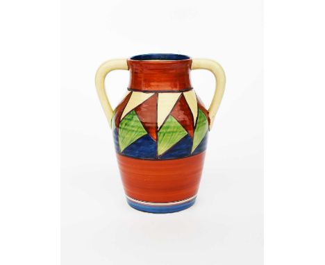 'Original Bizarre' a rare Clarice Cliff Bizarre twin-handled Lotus jug, painted with a band of red, green and blue triangles 