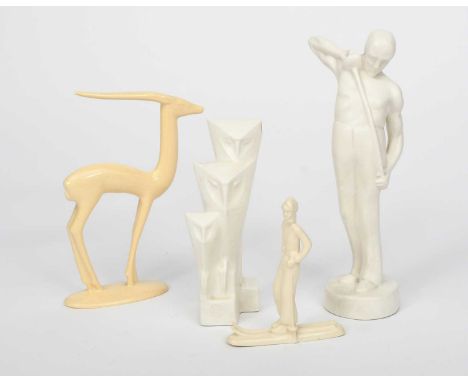 A Gouda Pottery model of a fencer, the male figure modelled standing holding his sword, covered in a cream glaze, a Gouda Pot