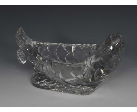 A Baccarat glass fish centrepiece the design attributed to Georges Chevalier, the clear glass fish with cut scale decoration 