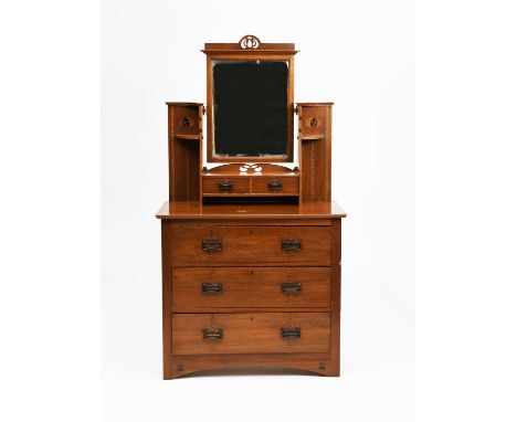 A Shapland and Petter oak dressing chest, inlaid with diaper bands and simple flower panels, three drawer chest below central