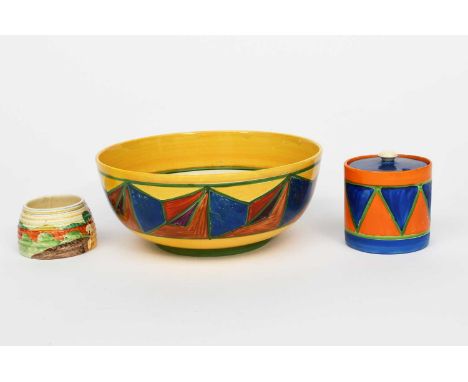 'Original Bizarre' a Clarice Cliff Cylindrical preserve pot and cover, painted with blue and orange triangles outlined in gre