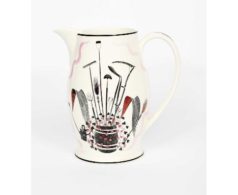 A Wedgwood Pottery Garden Implements lemonade jug designed by Eric Ravilious, printed with a barrel of garden tools, the reve