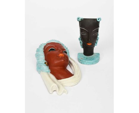 A Goldscheider Pottery bust, model no.7379, modelled as a female with stylised features and blue ringlets, on blue base, and 