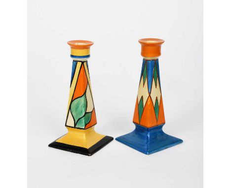 'Double V' a Clarice Cliff Fantasque Bizarre Octagonal candlestick, painted in colours, and a Clarice Cliff 'Original Bizarre