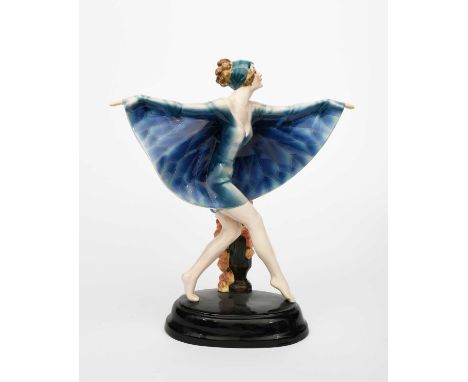 The Captured Bird a Goldscheider Pottery figure designed by Josef Lorenzl, model no. 5434, modelled as a female dancer with a
