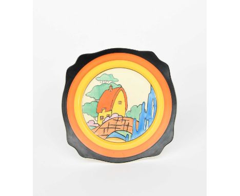 'Orange Roof Cottage' a Clarice Cliff Fantasque Bizarre plate, painted in colours printed factory marks, 22.5cm. wide Provena