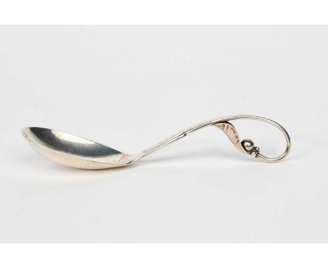A Georg Jensen Ornamental pattern silver spoon, no.21 the stem curved with foliate terminal, stamped marks, 13cm. long