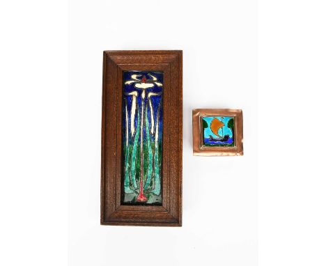 An Art Nouveau enamel panel probably Scottish, rectangular, enamelled with a single flag iris stem, in original oak frame, an