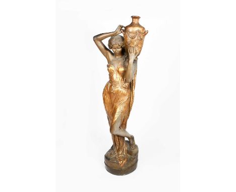 A tall Art Nouveau Goldscheider Pottery Porteuse d'Eau figure probably designed by Haniroff, model no.3407, modelled as a cla