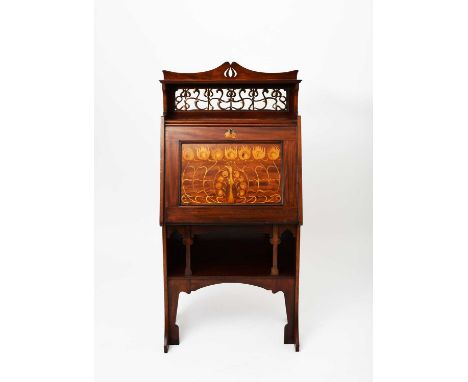 An Art Nouveau Shapland and Petter Peacock mahogany bureau, fall front desk with marquetry peacock panel, the back with brass