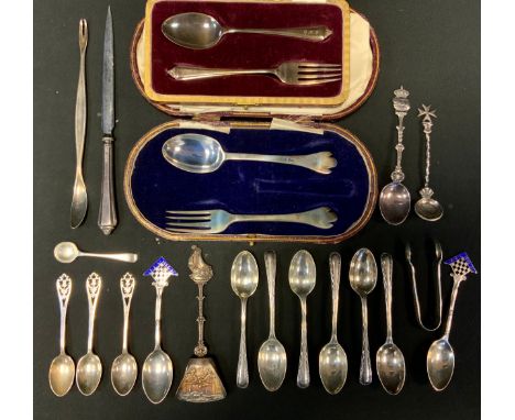 A silver christening set, Sheffield 1954, cased,  another;  set of six tea spoons etc 9.45ozt 