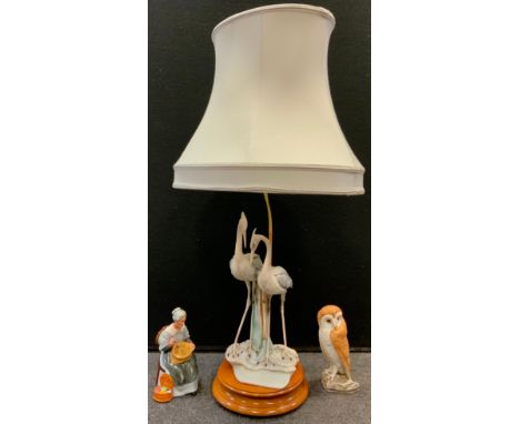 A Capodimonte table lamp, as two Herons;  Royal Doulton figure, Embroidering Hn 2855 etc (3) 