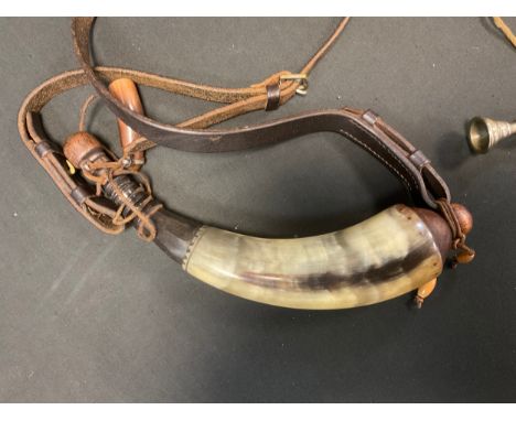 A stained horn bugle. decorated with Sherwood Foresters regimental Archer and Stag figures;  similar powder flask 