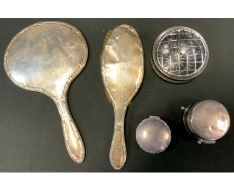 Silver Dressing table set, conforming brush and mirror; marks rubbed; lidded trinket dish, Birmingham, 1871; etc 