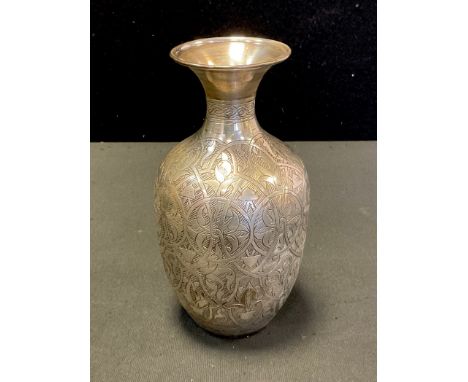 An Egyptian silver vase, all-over geometric decoration, impressed marks, 14.7cm high, 166.5g 
