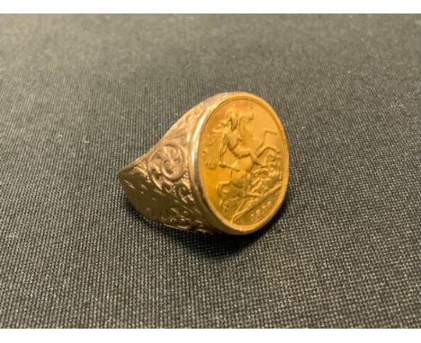 A George V 1916 half sovereign signet ring, 9ct gold shank, size N, 10g gross 