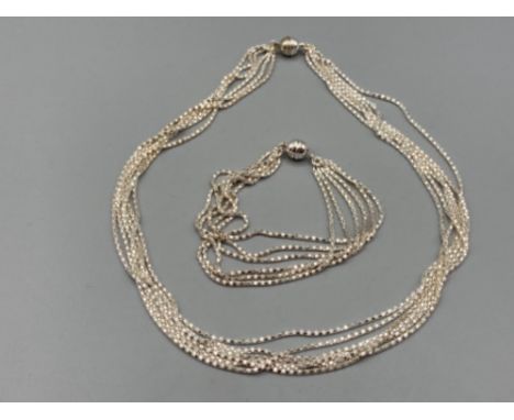 Silver necklace and matching bracelet with magnetic clasps 28.5g gross