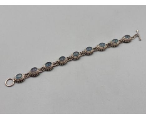 A silver and opal bracelet by Suarti 33.1g gross