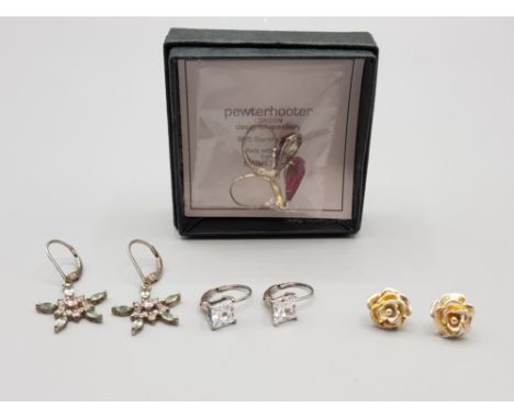 Four pairs of silver earrings one pair by Pewter Hooter