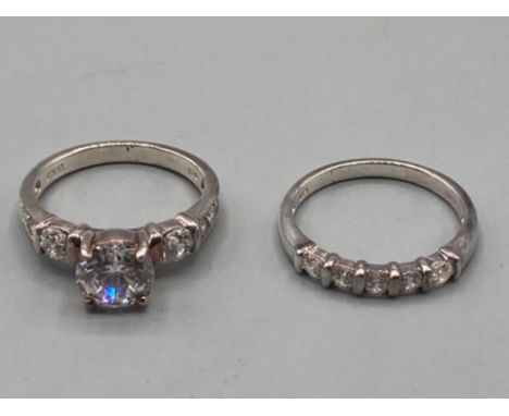 Two silver and CZ rings sizes K and J 4.9g gross