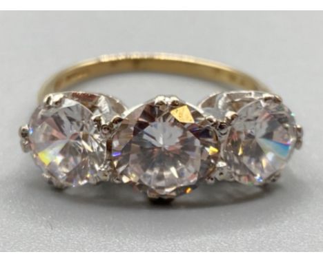 Ladies 9ct yellow gold 3 stone ring comprising of 3 round cubic zirconias set in a claw setting, 4.4g, size P