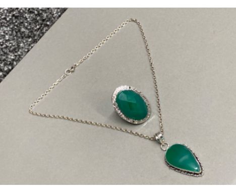 Silver 925 ring with large green stone together with a pear shaped green stone silver pendant on chain, 30g gross