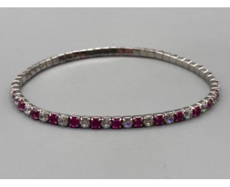An elastic silver 925 CZ and pink stone bracelet 6.3G gross